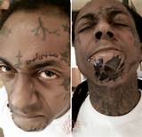 Lil Wayne ObtÃ©m um olho & texto Ã¡rabe tatuado no rosto