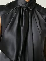 blusa de laÃ§o Givenchy bichano preto