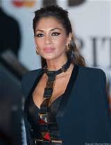 Nicole Scherzinger das Pussycat Dolls estÃ¡ se abrindo sobre a batalha...